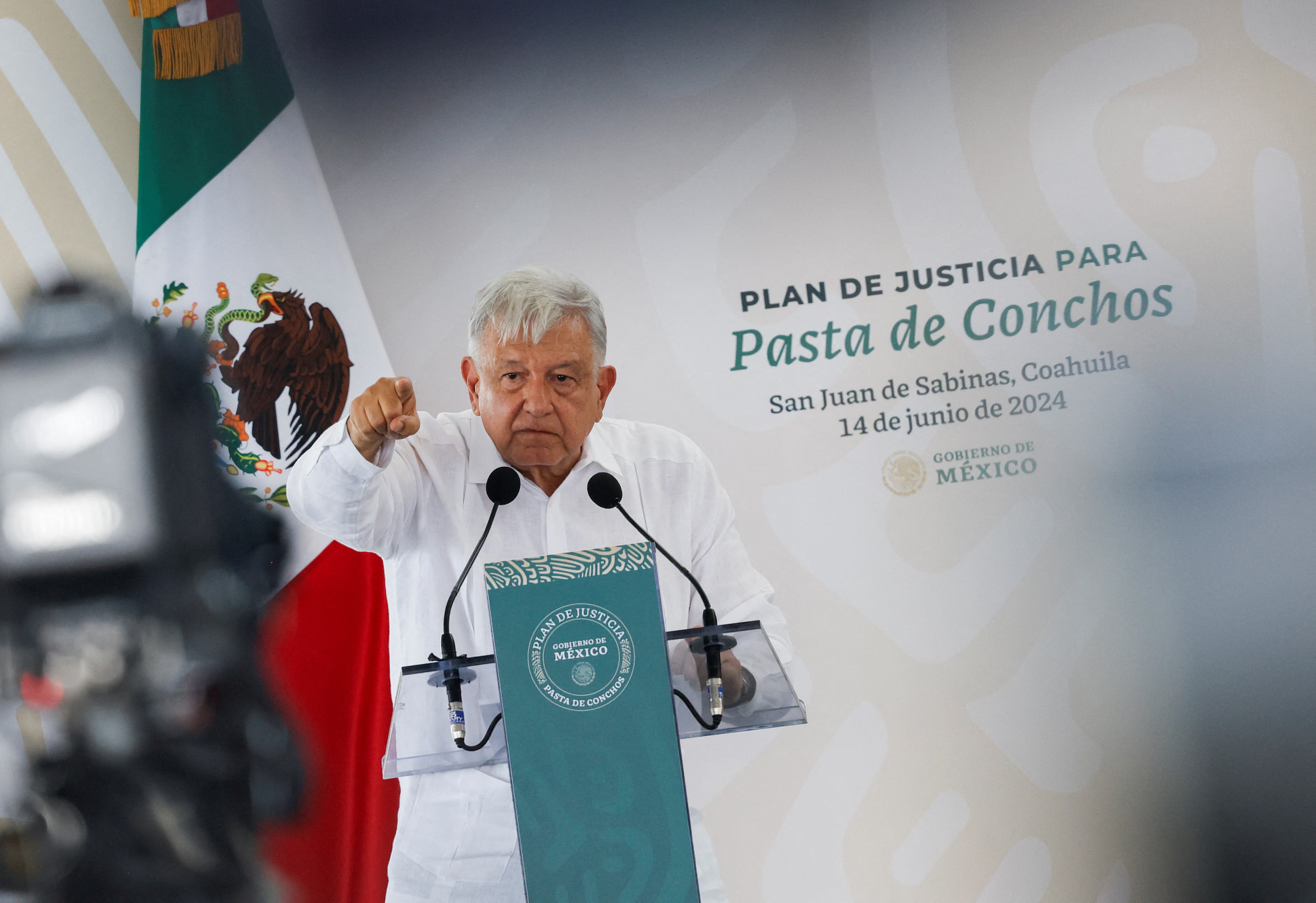 Mexican President Andres Manuel Lopez Obrador speaks during an event with relatives of the more than 60 miners who lost their lives in the Pasta de Conchos coal mine tragedy in February 2006, in Nueva Rosita, Mexico June 14, 2024. REUTERS/Daniel Becerril