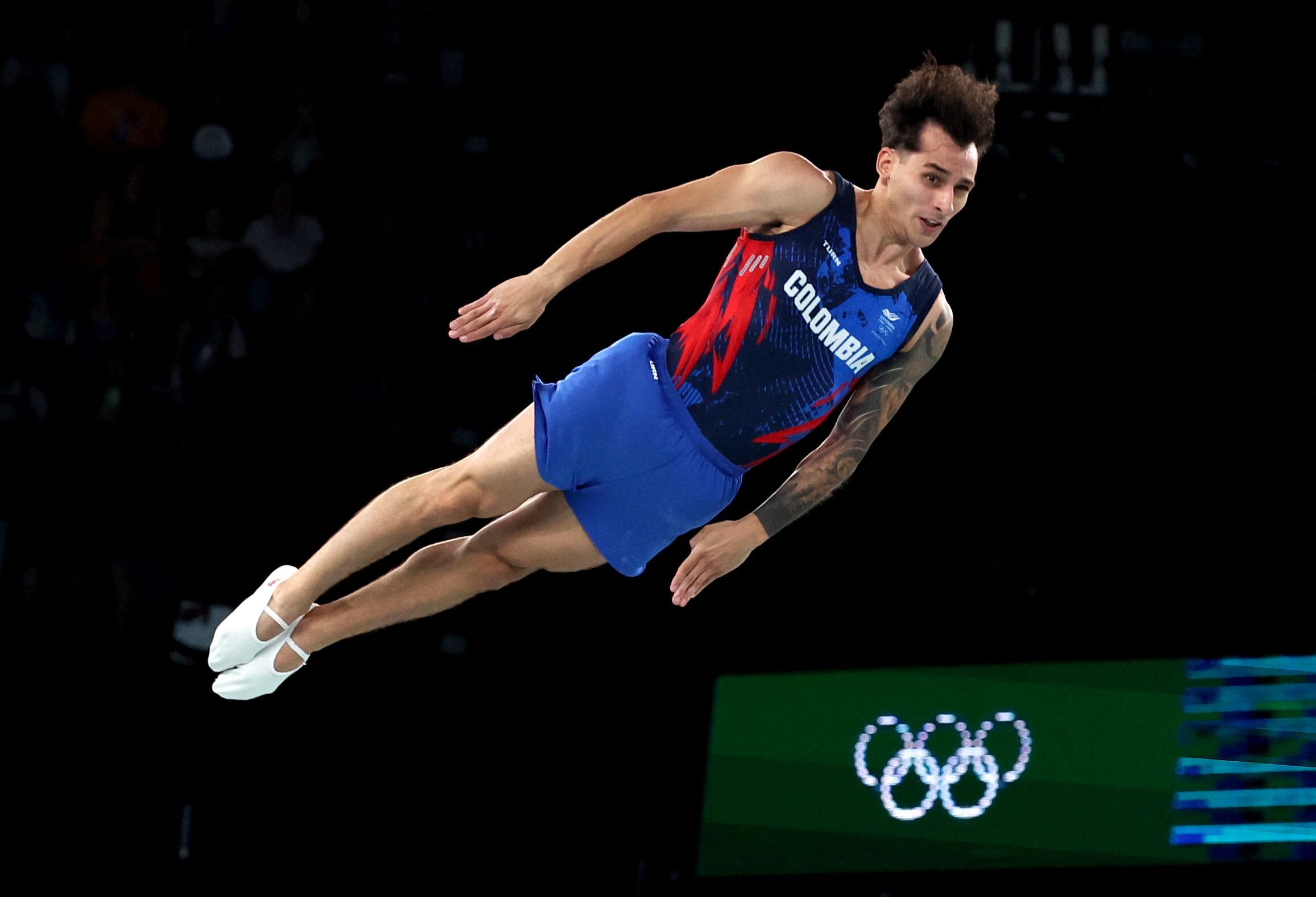 Ángel Hernández se encuentra fuera de zona de clasificación para la gimnasia en trampolín a falta de un turno- crédito Mike Blake / REUTERS