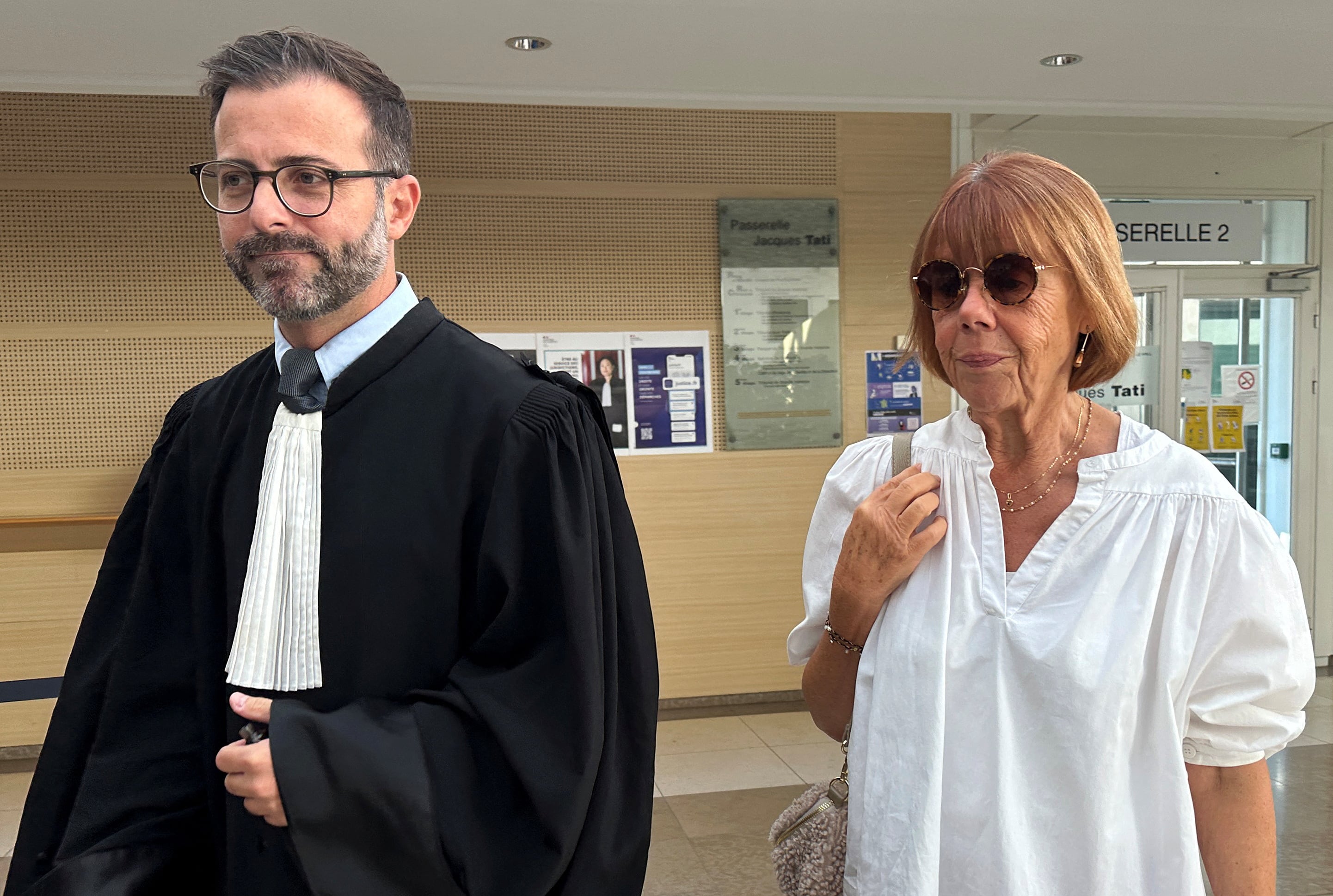 Gisele Pelicot, who has allegedly been drugged and raped by men solicited by her husband Dominique Pelicot, arrives with her lawyer Antoine Camus during the trial of her husband with 50 co-accused, at the courthouse in Avignon, France, September 19, 2024.  REUTERS/Antony Paone