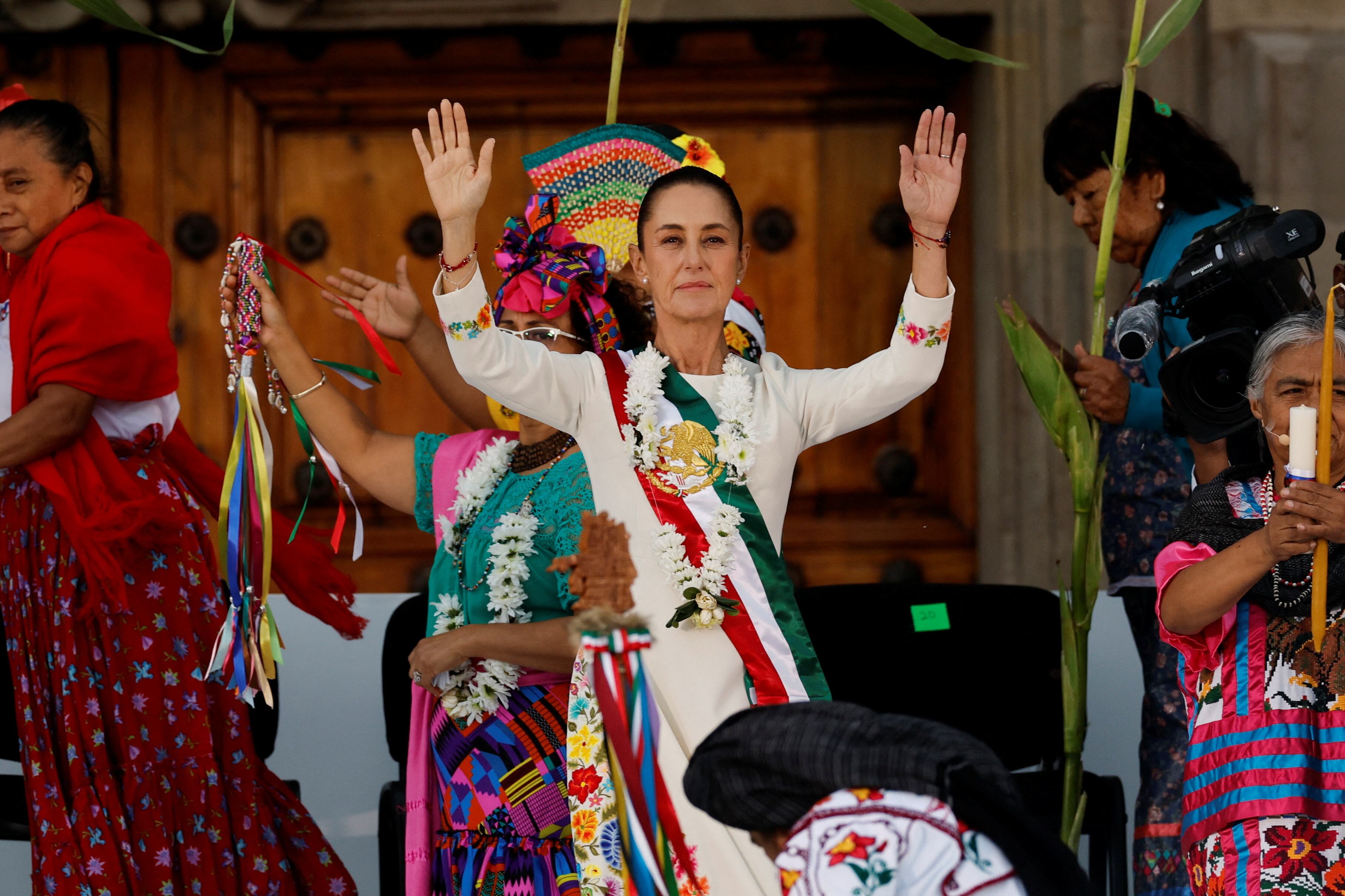 Mexico's new President Claudia Sheinbaum participates in a ceremony where she receives the "baton of command", at Zocalo Square in Mexico City, Mexico October 1, 2024. REUTERS/Daniel Becerril