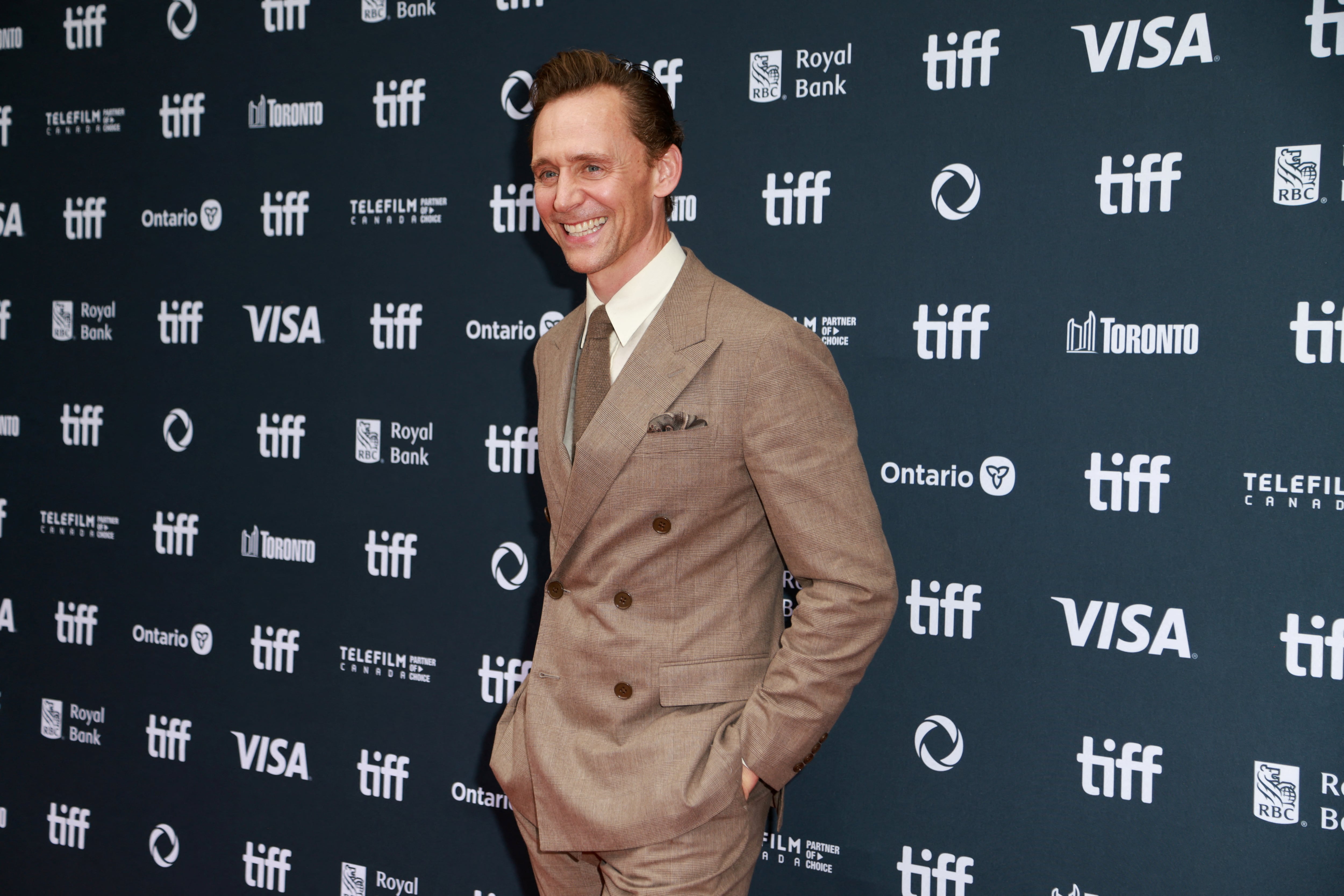 Tom Hiddleston poses on the red carpet before "The Life of Chuck" is screened, as the Toronto International Film Festival (TIFF) returns for its 49th edition in Toronto, Ontario, Canada, September 6, 2024. REUTERS/Carlos Osorio