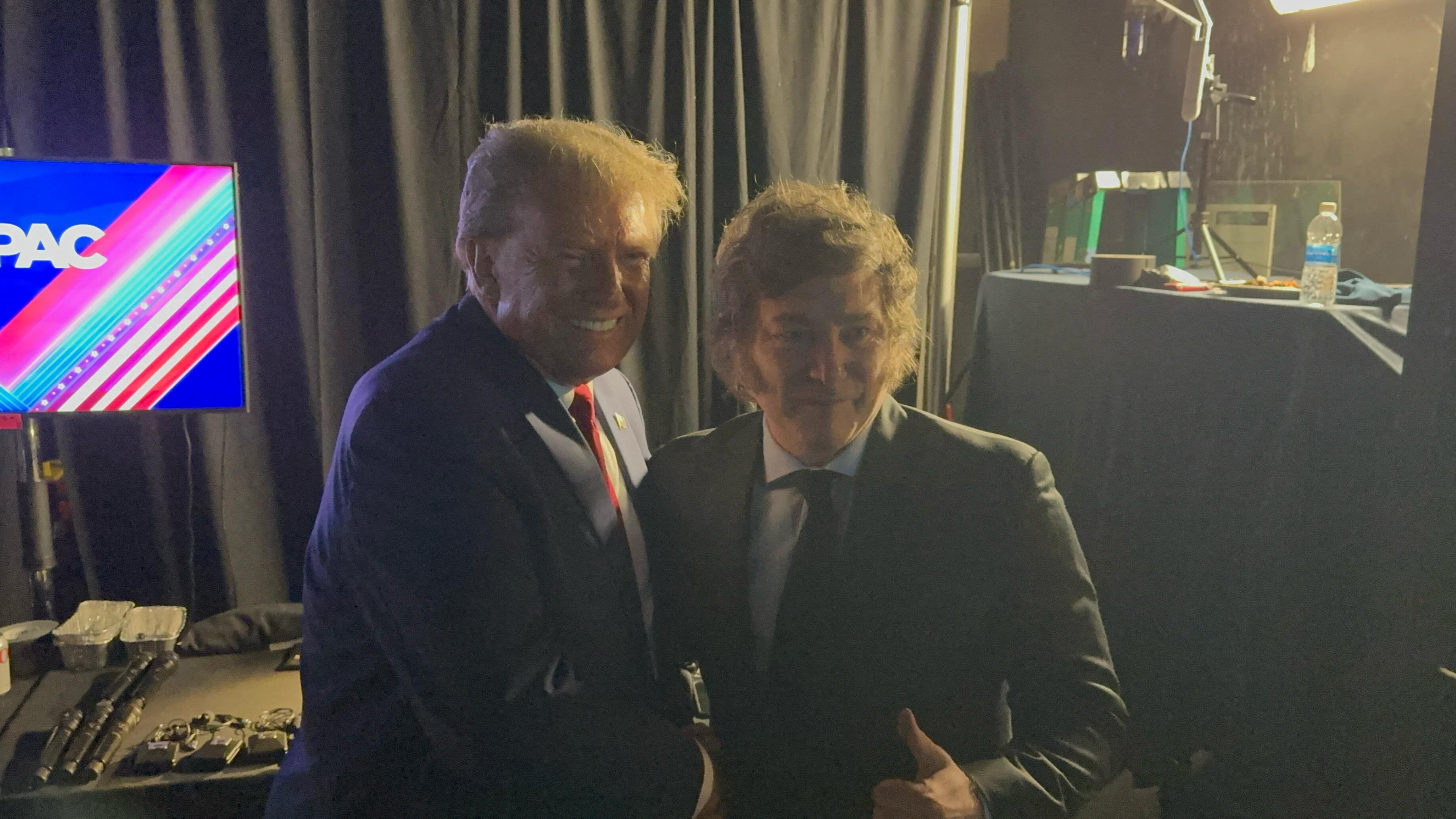 Former U.S. President and Republican presidential candidate Donald Trump poses for a picture with Argentina's President Javier Milei at the Conservative Political Action Conference (CPAC) annual meeting in National Harbor, Maryland, U.S., February 24, 2024. Argentine Presidency/Handout via REUTERS THIS IMAGE HAS BEEN SUPPLIED BY A THIRD PARTY. NO RESALES. NO ARCHIVES