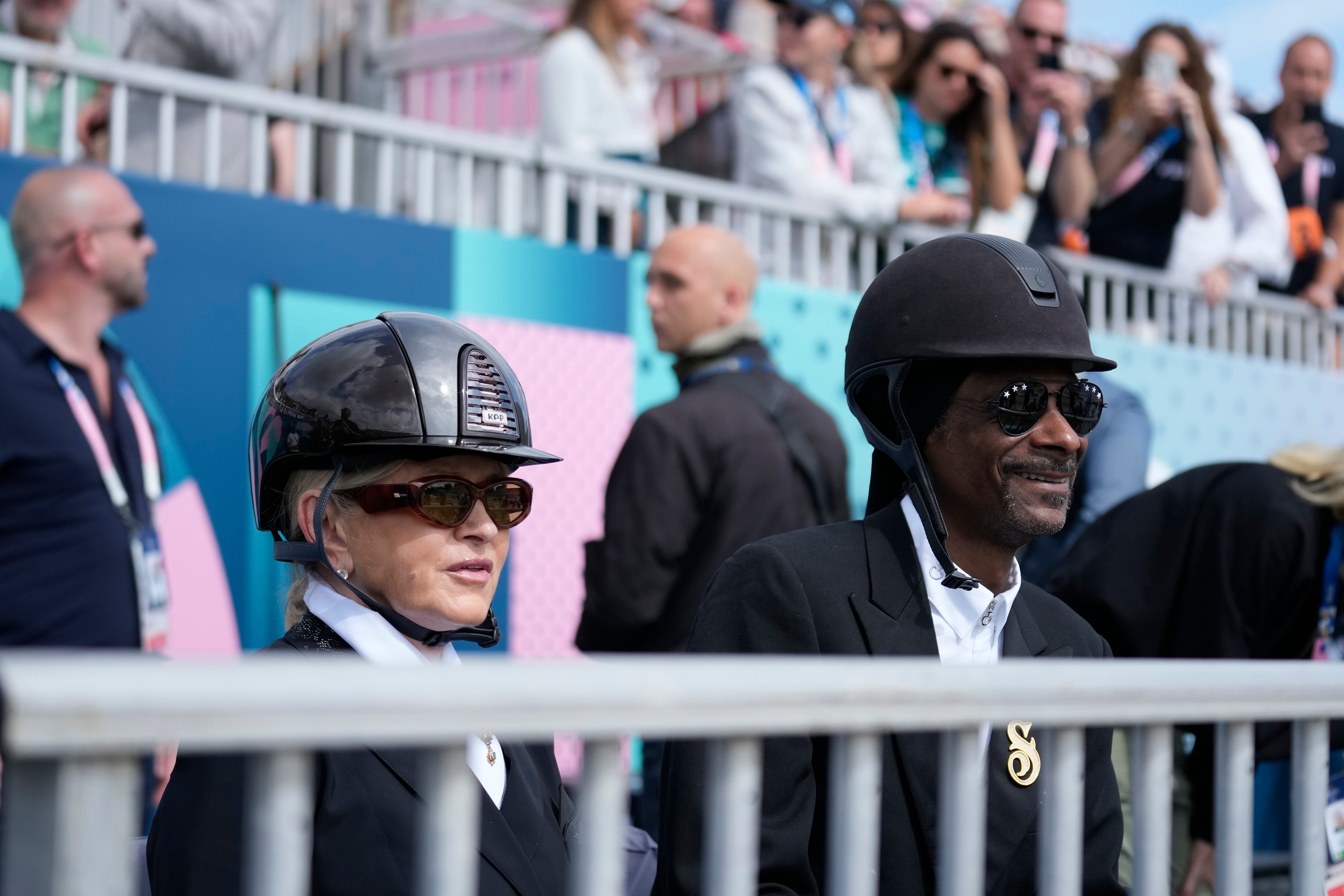 Snoop Dogg and Martha Stewart watch the final of the dressage team event at the 2024 Summer Olympics on Saturday, August 3, 2024, in Versailles, France. (AP Photo/Mosa'ab Elshamy)