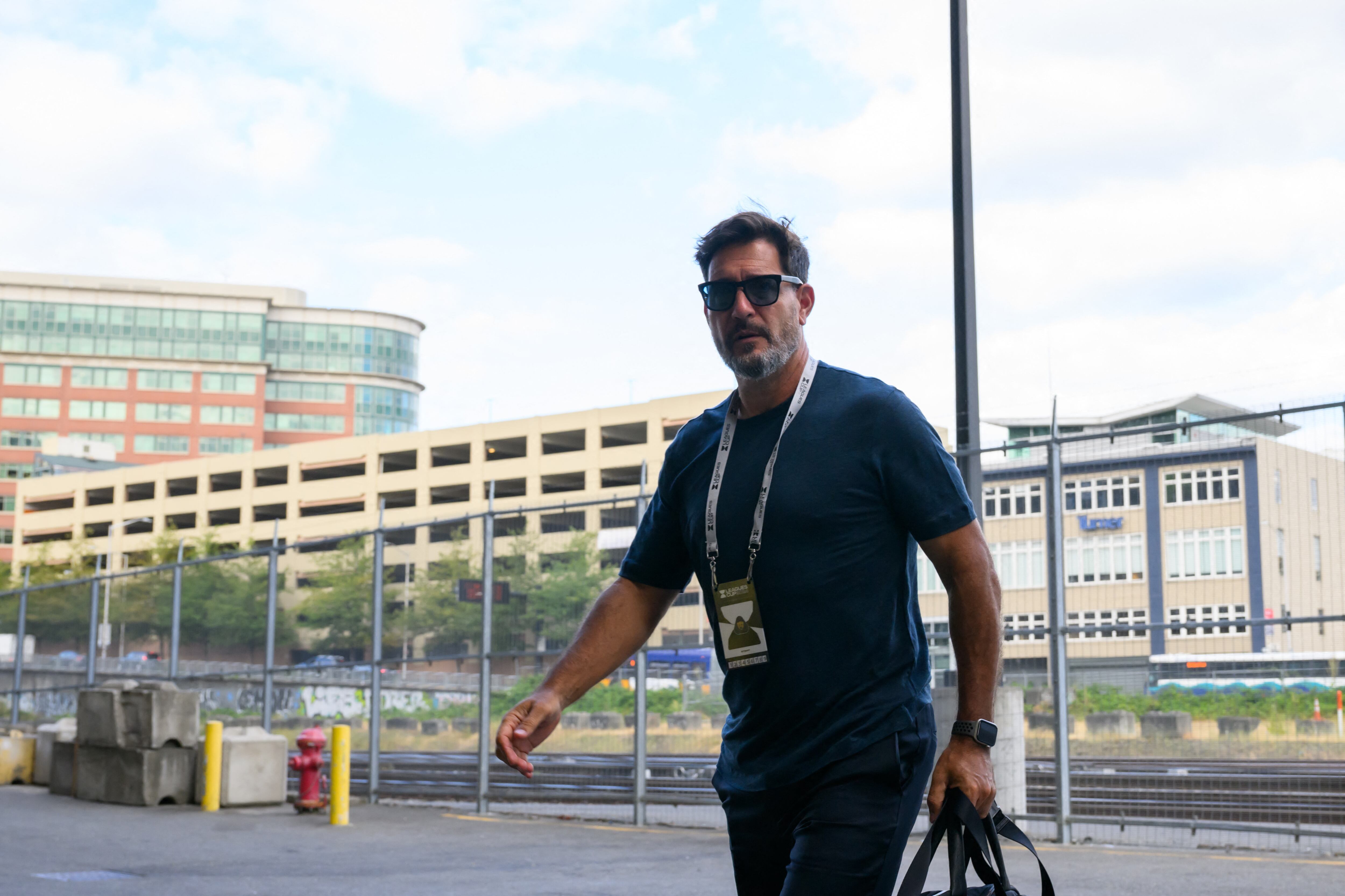 Aug 12, 2024; Seattle, Washington, USA; Pumas UNAM head coach Gustavo Lema arrives at the stadium before the game against the Seattle Sounders FC at Lumen Field. Mandatory Credit: Steven Bisig-USA TODAY Sports