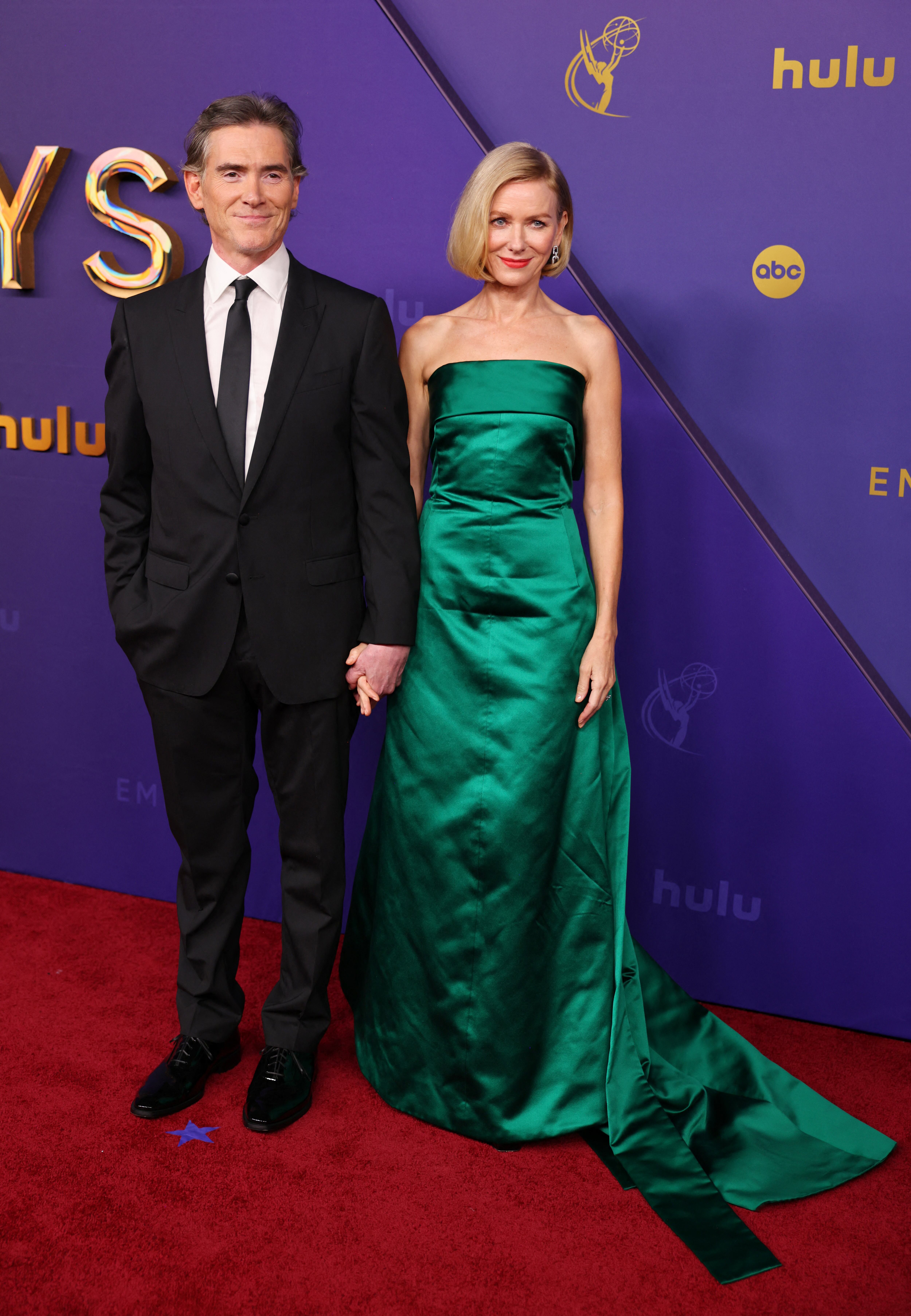 La pareja de Billy Crudup y Naomi Watts, elegantísimos en la red carpet (REUTERS/Mike Blake)