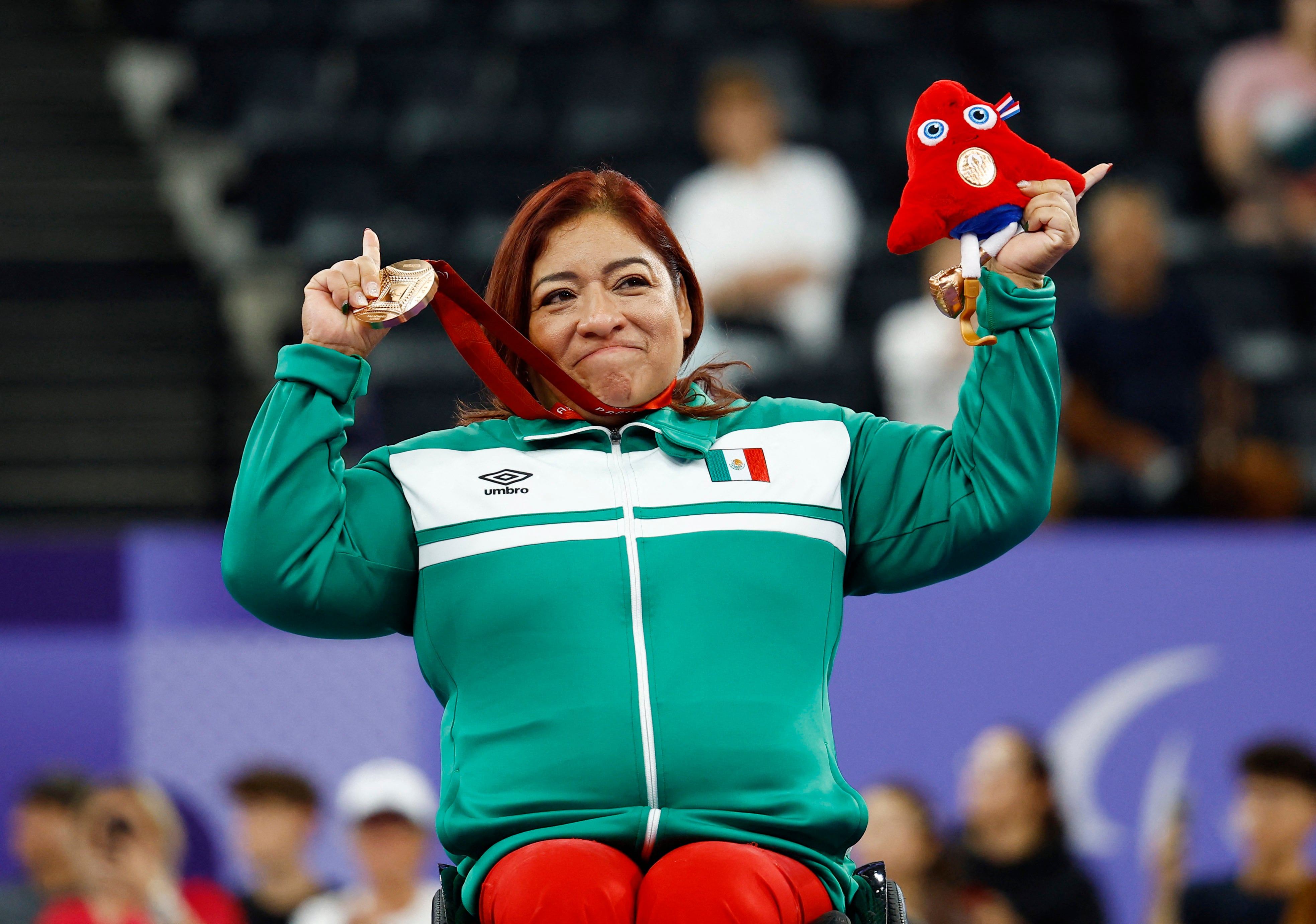 Paris 2024 Paralympics - Powerlifting - Women's up to 61Kg - Medal Ceremony - Porte de La Chapelle Arena, Paris, France - September 6, 2024 Bronze medallist Amalia Perez Vazquez of Mexico celebrates REUTERS/Rula Rouhana