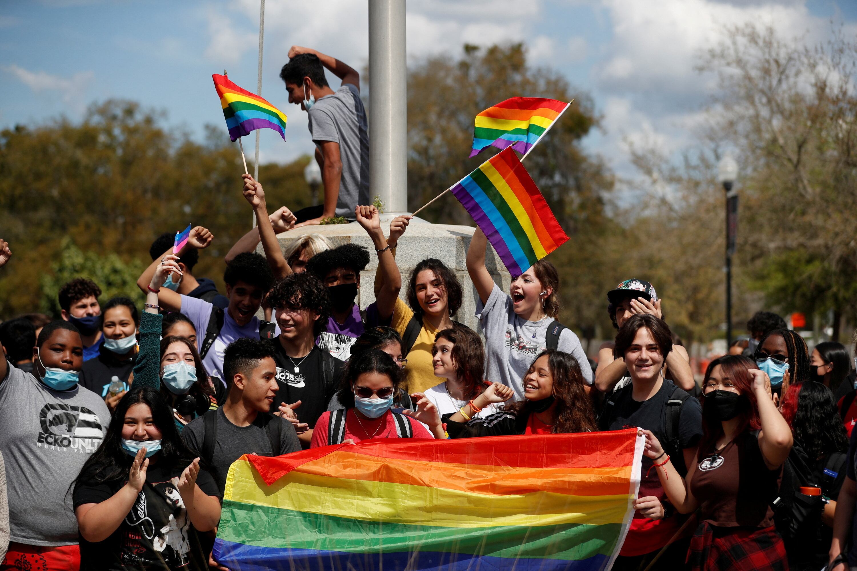 FILE PHOTO: Hillsborough High School students protest a Republican-backed bill dubbed the "Don't Say Gay" that would prohibit classroom discussion of sexual orientation and gender identity, a measure Democrats denounced as being anti-LGBTQ, in Tampa, Florida, U.S., March 3, 2022.  REUTERS/Octavio Jones/File Photo