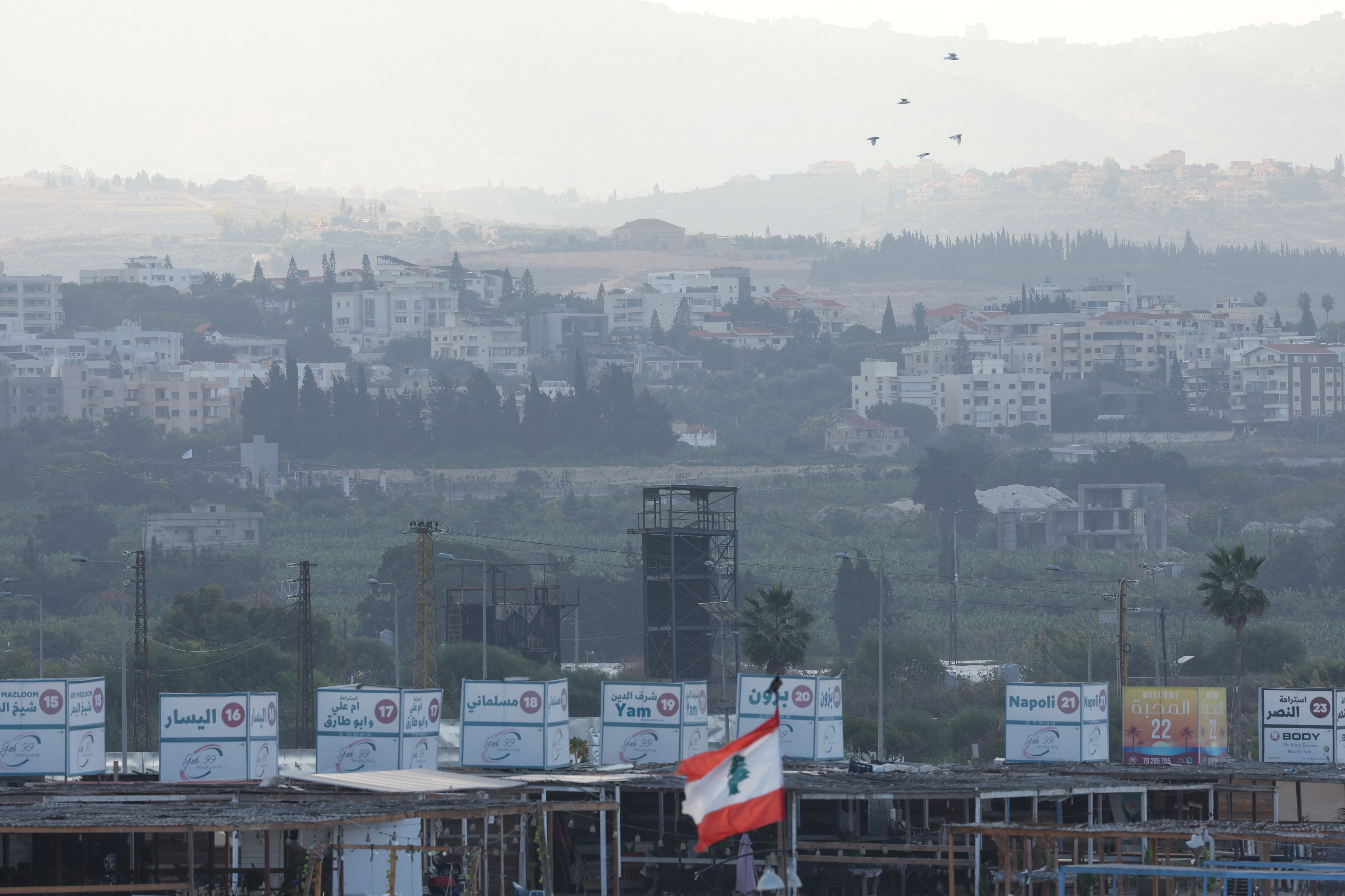 A view shows Lebanese southern villages, as seen from Tyre, amid ongoing hostilities between Hezbollah and Israeli forces, southern Lebanon October 1, 2024. REUTERS/Aziz Taher