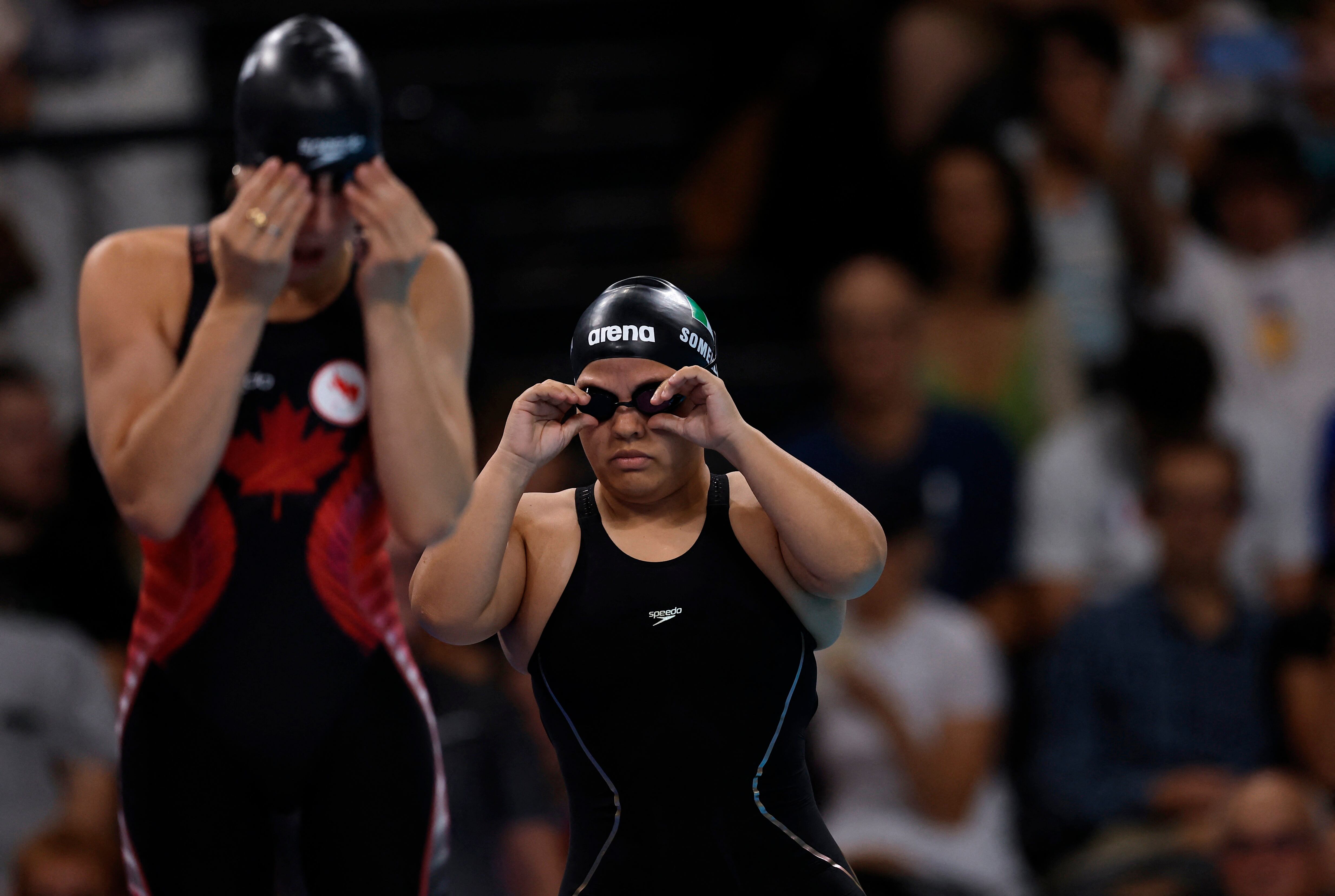 Paris 2024 Paralympics - Swimming - Women's 400m Freestyle - S7 Heats - Paris La Defense Arena, Nanterre, France - September 2, 2024 Sabrina Duchesne of Canada and Naomi Somellera Mandujano of Mexico before the start REUTERS/Andrew Couldridge