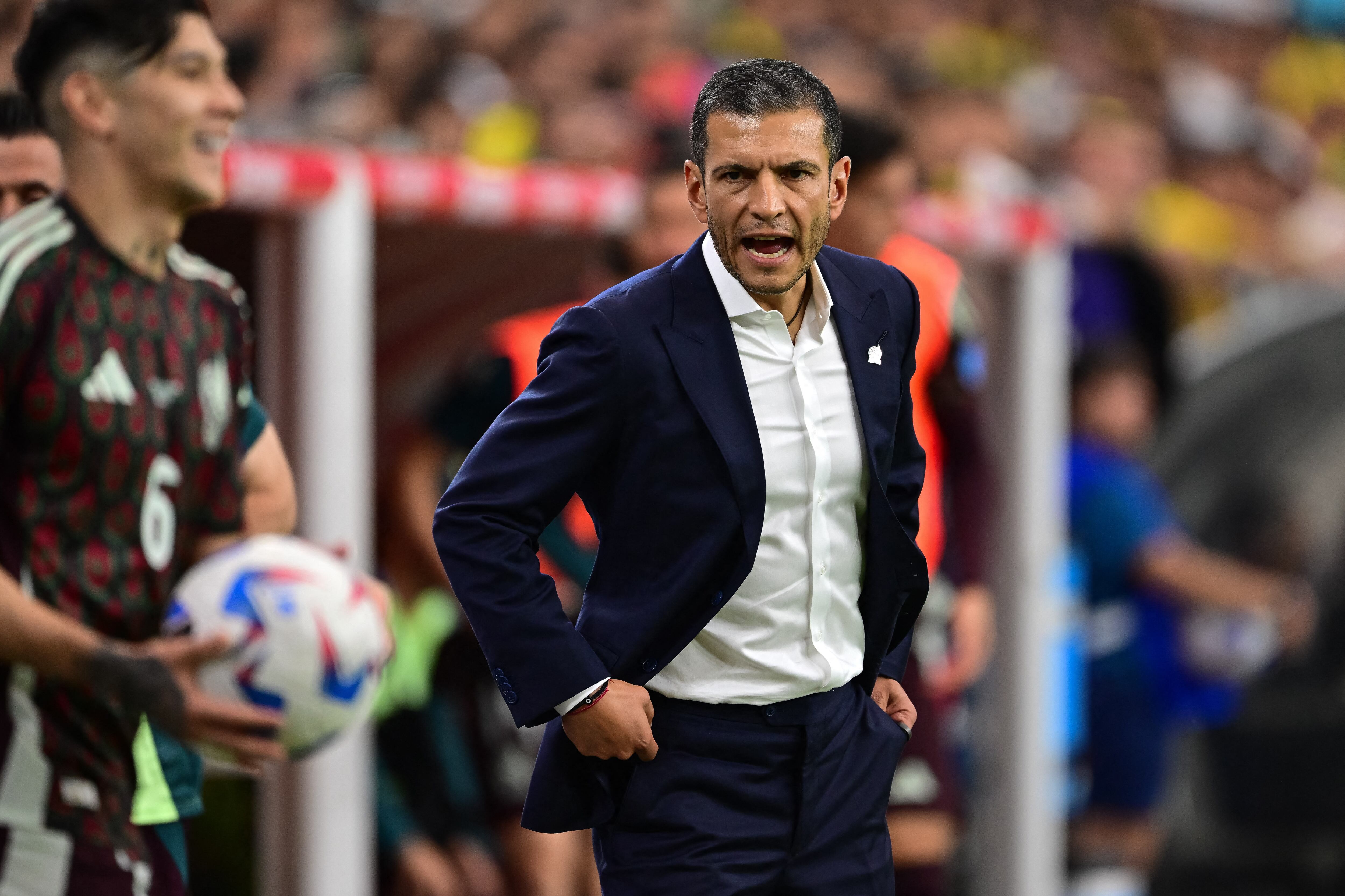 Jun 30, 2024; Glendale, AZ, USA; Mexico head coach Jaime Lozano looks on against Ecuador during the first half at State Farm Stadium. Mandatory Credit: Daniel Bartel-USA TODAY Sports