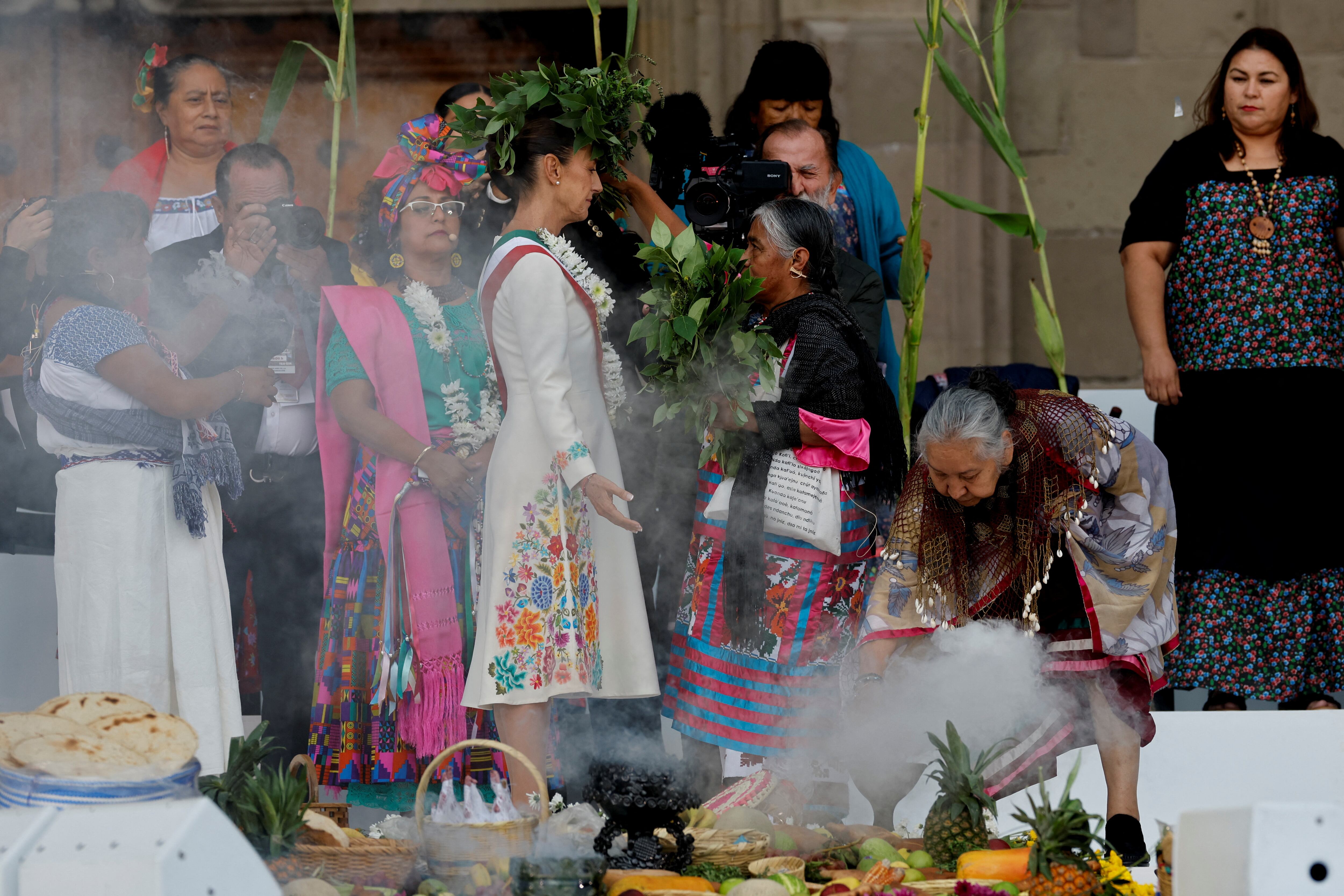 Mexico's new President Claudia Sheinbaum participates in a ceremony where she receives the "baton of command", at Zocalo Square in Mexico City, Mexico October 1, 2024. REUTERS/Daniel Becerril