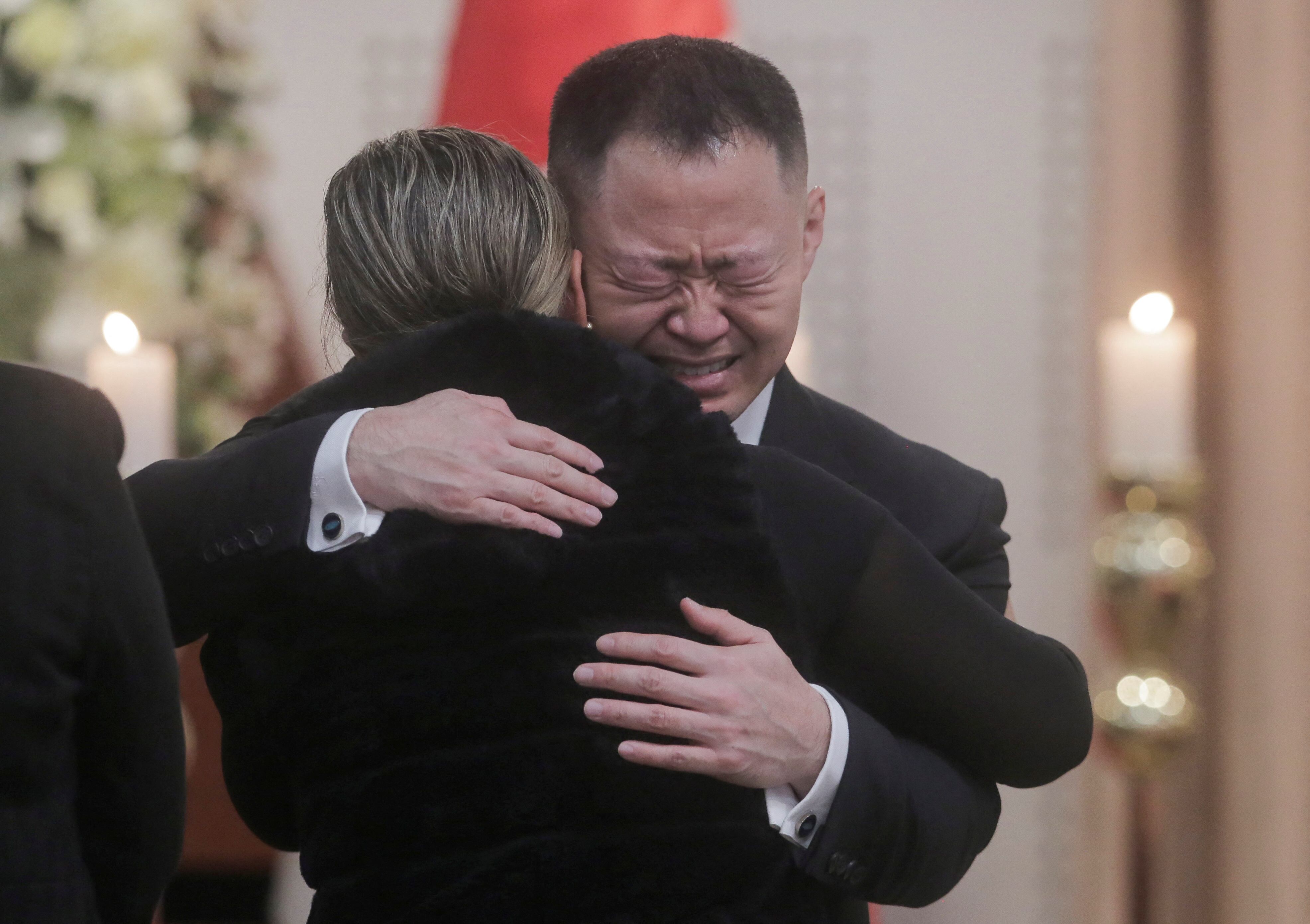 Kenji Fujimori reacts as the coffin containing the body of his father, Peru's former President Alberto Fujimori, is exhibited for a posthumous tribute, at the Museo de la Nacion, in Lima, Peru, September 12, 2024. REUTERS/Gerardo Marin