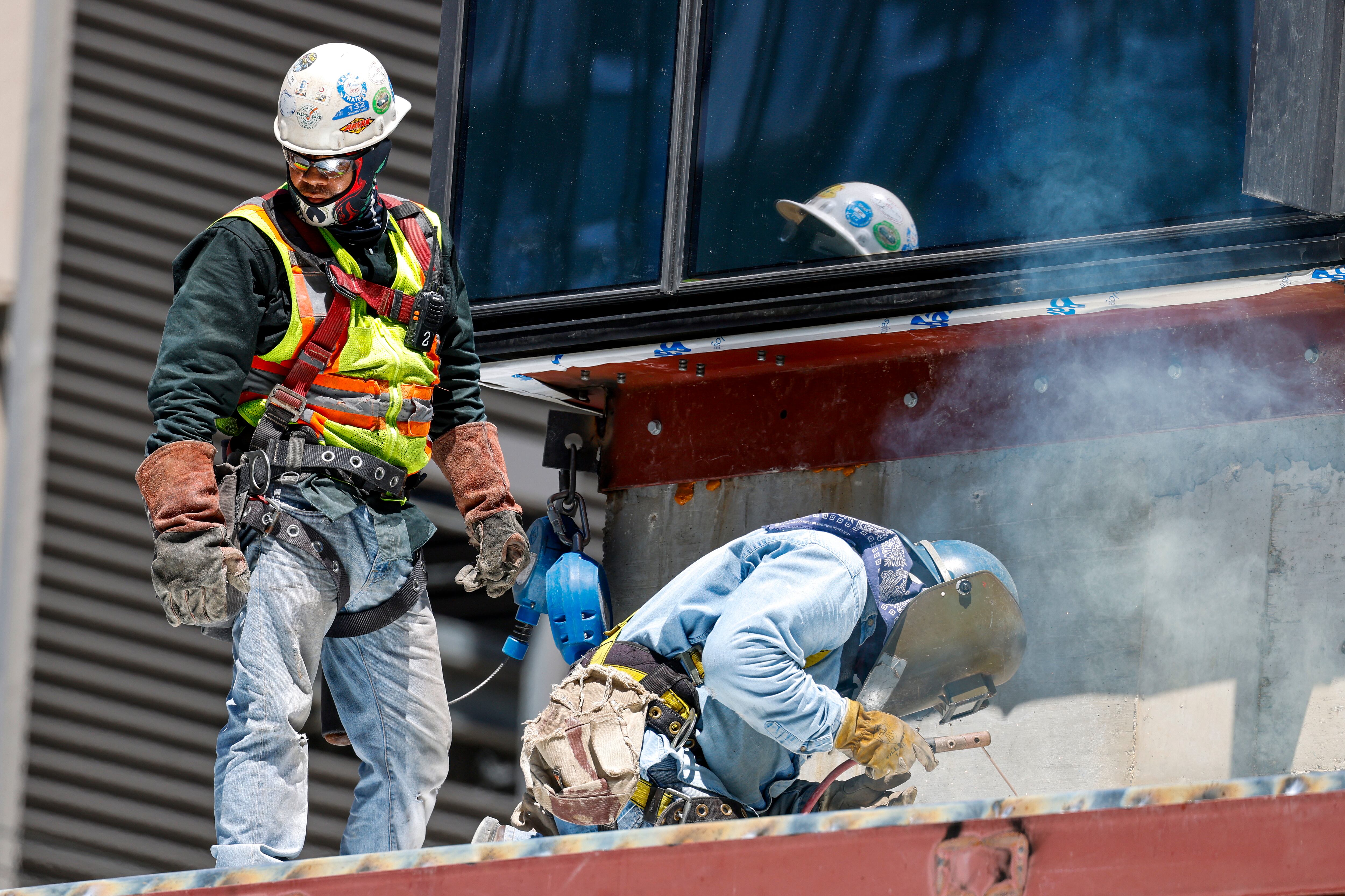 Trabajadores de la construcción (EFE/ADAM DAVIS)
