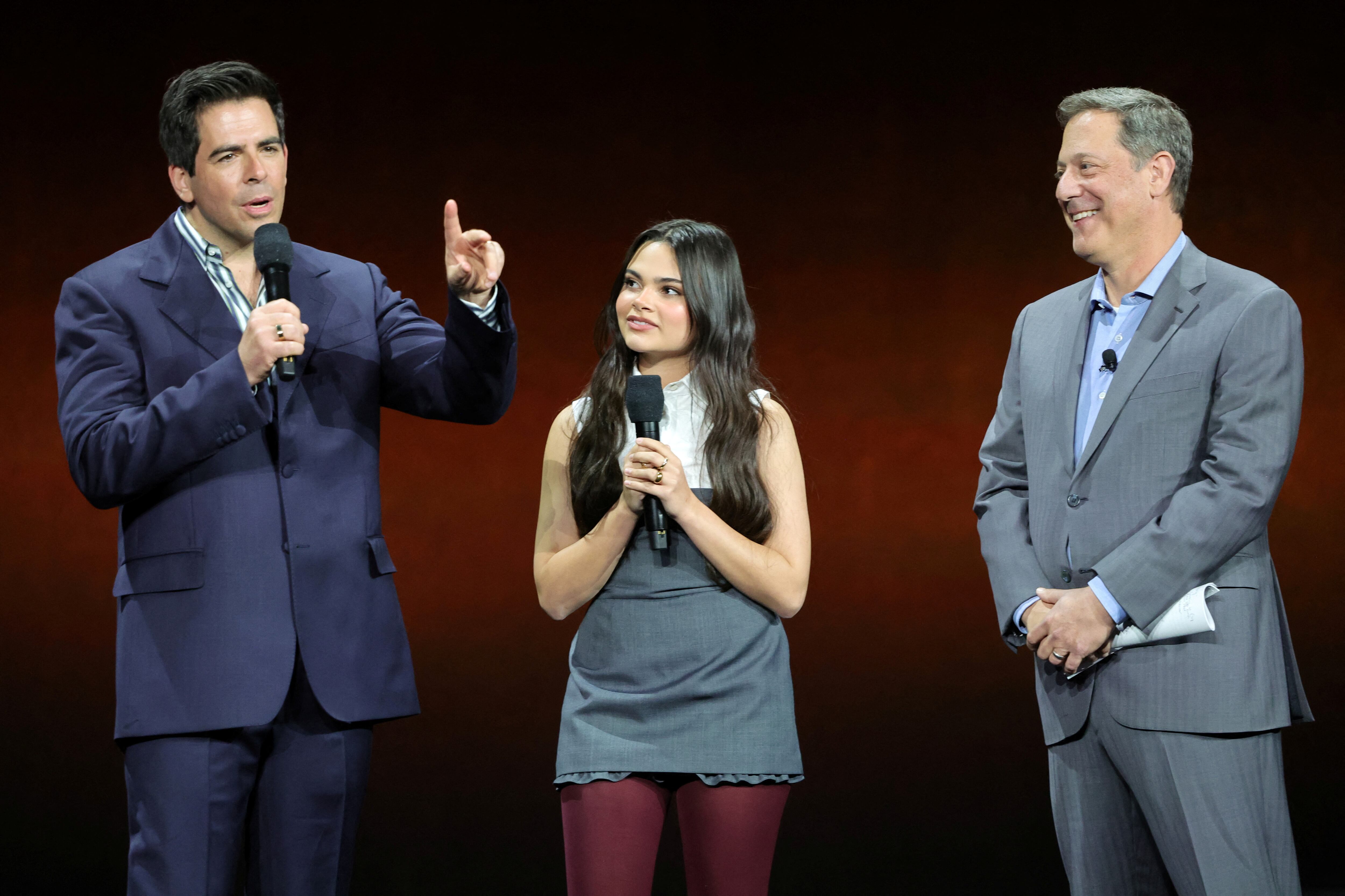 Writer/director Eli Roth and actor Ariana Greenblatt, promoting the film Borderlands, speak with Adam Fogelson, chair of the Lionsgate Motion Picture Group, during a Lionsgate presentation at CinemaCon, the official convention of the National Association of Theatre Owners, in Las Vegas, Nevada, U.S. April 10, 2024. REUTERS/Steve Marcus